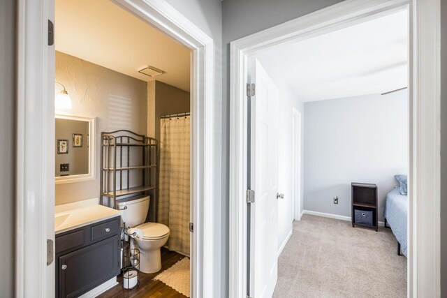 2403 English Hill Dr, Murfreesboro, TN 37130 - bathroom with visible vents, toilet, vanity, and baseboards