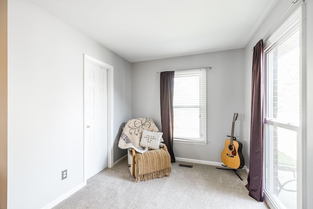 2403 English Hill Dr, Murfreesboro, TN 37130 - living area featuring visible vents, light colored carpet, and baseboards