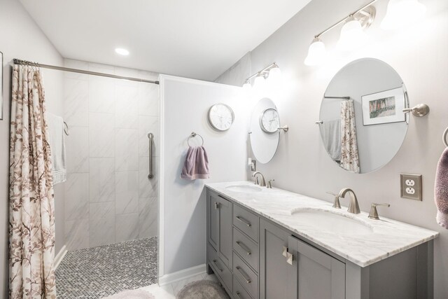 2403 English Hill Dr, Murfreesboro, TN 37130 - full bathroom with double vanity, a tile shower, and a sink