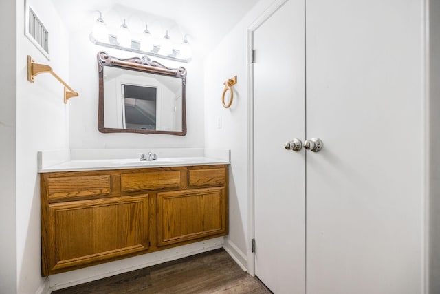 2403 English Hill Dr, Murfreesboro, TN 37130 - bathroom with vanity, visible vents, and wood finished floors