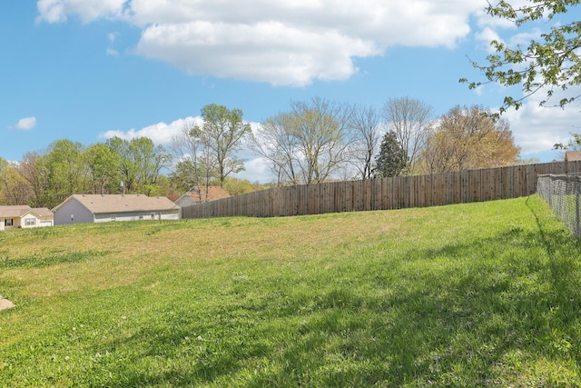 view of yard with fence