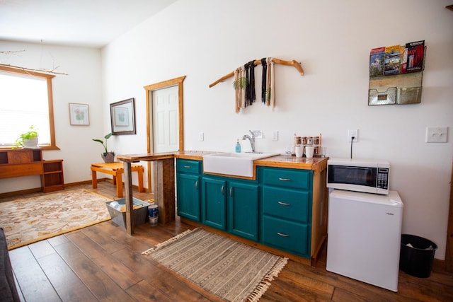 0 Burnt Hill Rd, Unionville, TN 37180 - kitchen with dark wood-style floors, a sink, white microwave, and fridge