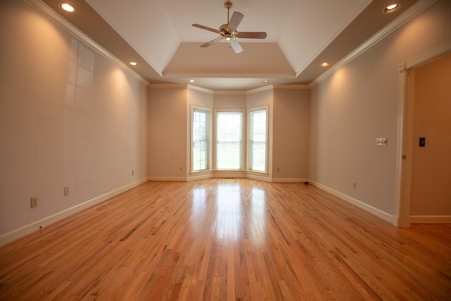 2132 Neelys Bend Rd, Madison, TN 37115 - spare room with a tray ceiling, a ceiling fan, light wood-style flooring, ornamental molding, and recessed lighting