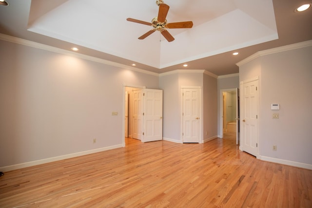 2132 Neelys Bend Rd, Madison, TN 37115 - unfurnished bedroom featuring recessed lighting, light wood-type flooring, a tray ceiling, baseboards, and high vaulted ceiling