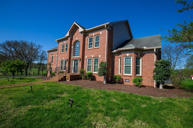 2132 Neelys Bend Rd, Madison, TN 37115 - view of front of home featuring brick siding and a front lawn