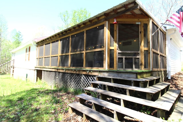 320 Benson Rd, Reagan, TN 38368 - rear view of property featuring a sunroom