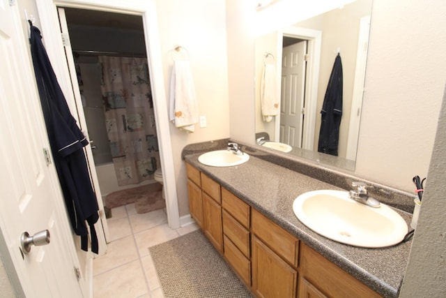 320 Benson Rd, Reagan, TN 38368 - bathroom with toilet, tile patterned floors, double vanity, and a sink