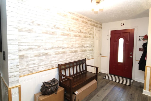 320 Benson Rd, Reagan, TN 38368 - foyer entrance with dark wood-type flooring and a textured ceiling