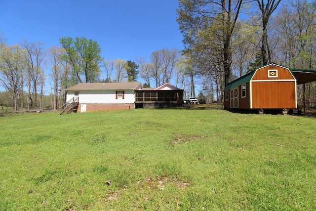 320 Benson Rd, Reagan, TN 38368 - view of yard with an outbuilding