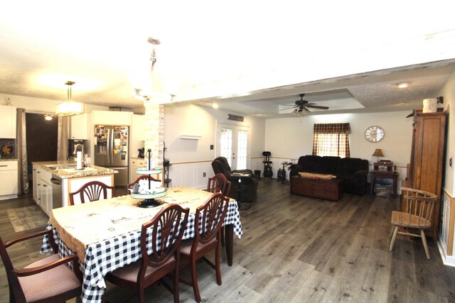 320 Benson Rd, Reagan, TN 38368 - dining space featuring visible vents, ceiling fan, and dark wood-style floors