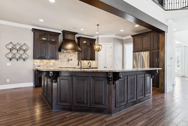 61 Harbor Cove Dr, Old Hickory, TN 37138 - kitchen with custom range hood, a breakfast bar area, baseboards, and high end fridge
