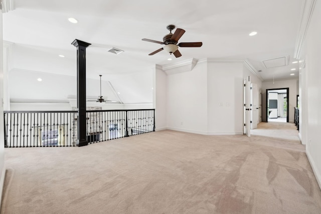 61 Harbor Cove Dr, Old Hickory, TN 37138 - empty room with baseboards, light carpet, attic access, a ceiling fan, and crown molding
