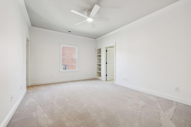 61 Harbor Cove Dr, Old Hickory, TN 37138 - unfurnished room with visible vents, baseboards, ornamental molding, ceiling fan, and light colored carpet