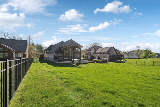 61 Harbor Cove Dr, Old Hickory, TN 37138 - rear view of property featuring a yard and a fenced backyard
