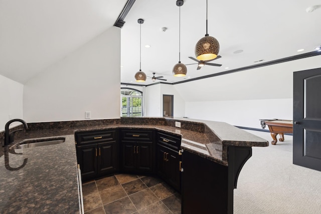 61 Harbor Cove Dr, Old Hickory, TN 37138 - kitchen featuring a sink, dark stone countertops, a peninsula, and lofted ceiling