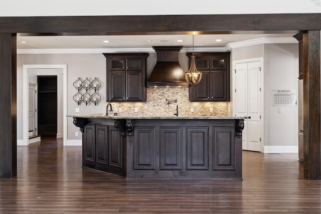 61 Harbor Cove Dr, Old Hickory, TN 37138 - kitchen featuring crown molding, custom range hood, baseboards, and a breakfast bar