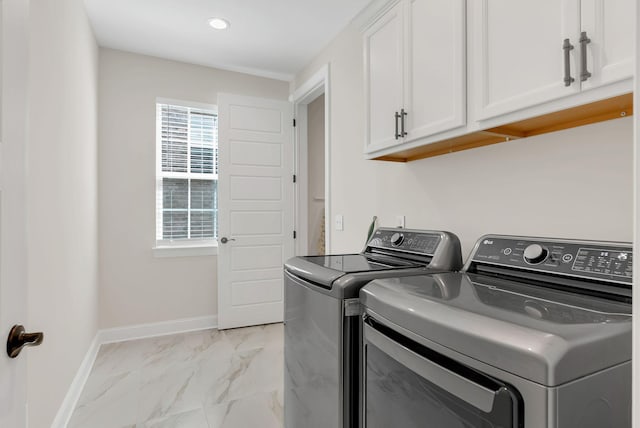 washroom with recessed lighting, marble finish floor, baseboards, cabinet space, and washer and clothes dryer