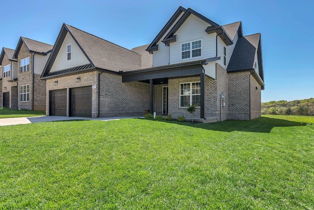 view of front facade with concrete driveway, roof with shingles, a front yard, brick siding, and a garage