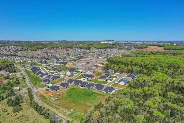 birds eye view of property with a residential view