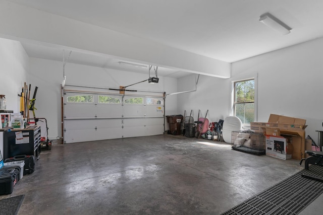 garage featuring a garage door opener