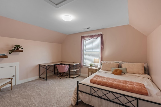 carpeted bedroom featuring visible vents, baseboards, and vaulted ceiling