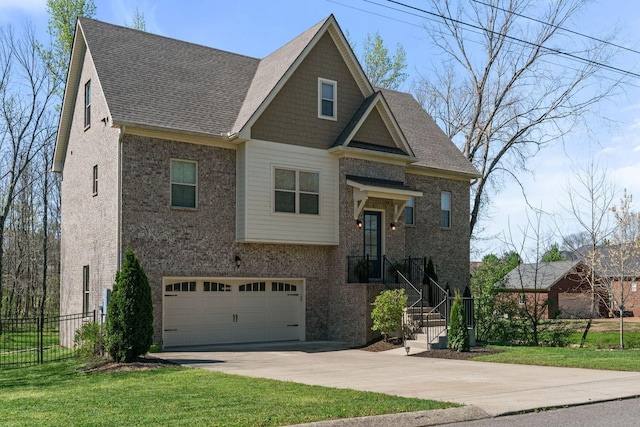 view of front of house featuring driveway, an attached garage, a front yard, brick siding, and fence