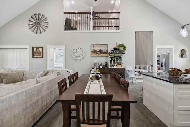 208 Lakeview Dr, Hohenwald, TN 38462 - dining room featuring high vaulted ceiling
