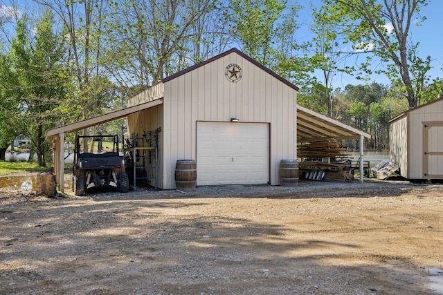 208 Lakeview Dr, Hohenwald, TN 38462 - garage with a garage and dirt driveway