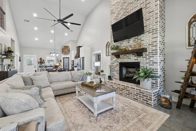 208 Lakeview Dr, Hohenwald, TN 38462 - living area featuring high vaulted ceiling, a brick fireplace, finished concrete flooring, ceiling fan, and recessed lighting