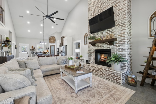 208 Lakeview Dr, Hohenwald, TN 38462 - living room featuring high vaulted ceiling, a fireplace, finished concrete floors, a ceiling fan, and recessed lighting