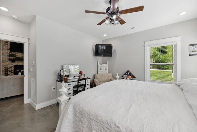 208 Lakeview Dr, Hohenwald, TN 38462 - bedroom featuring finished concrete flooring, baseboards, recessed lighting, a fireplace, and ceiling fan