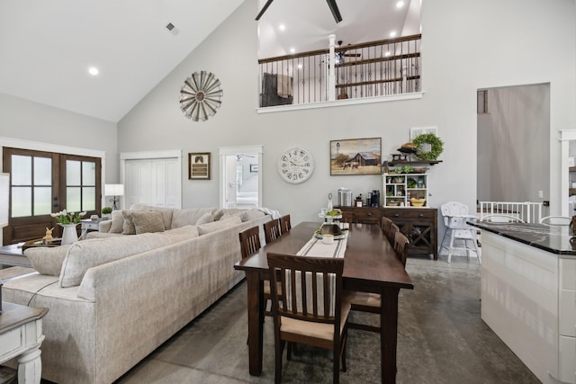208 Lakeview Dr, Hohenwald, TN 38462 - living room featuring high vaulted ceiling, finished concrete flooring, and recessed lighting