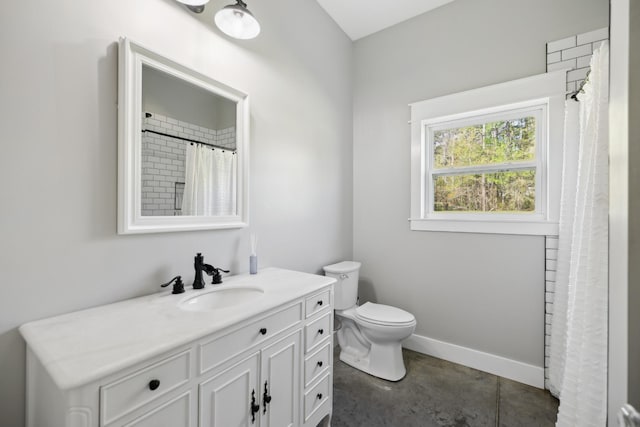 208 Lakeview Dr, Hohenwald, TN 38462 - full bath with vanity, toilet, concrete floors, curtained shower, and baseboards