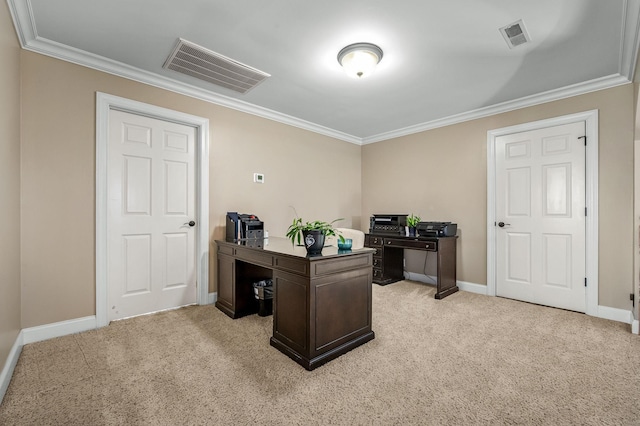 office area with ornamental molding, visible vents, and light colored carpet