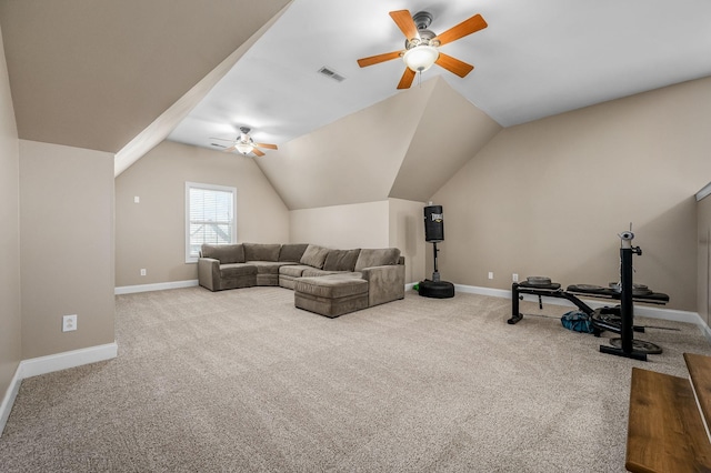 living area with visible vents, ceiling fan, carpet, and lofted ceiling