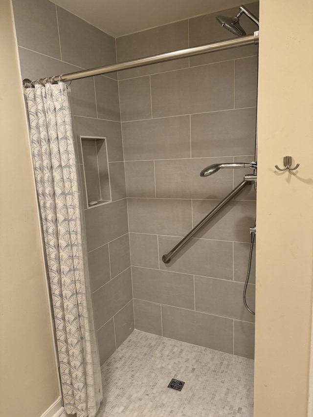 bathroom featuring a stall shower