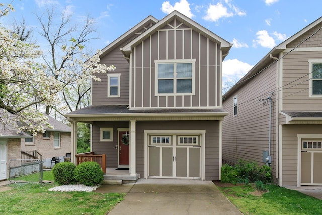 craftsman inspired home featuring covered porch, a garage, board and batten siding, fence, and driveway