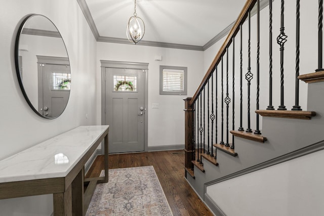 foyer with dark wood-style flooring, baseboards, crown molding, and stairs