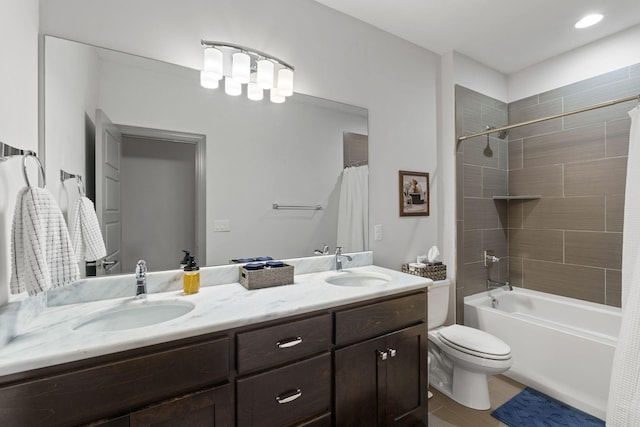 full bath featuring double vanity, a sink, toilet, and shower / bath combo with shower curtain