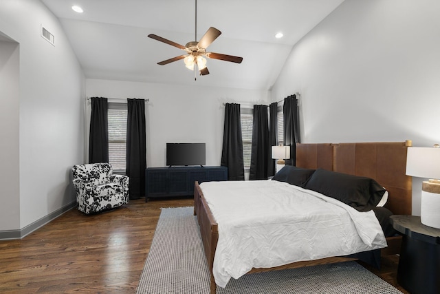 bedroom featuring wood finished floors, visible vents, lofted ceiling, and recessed lighting
