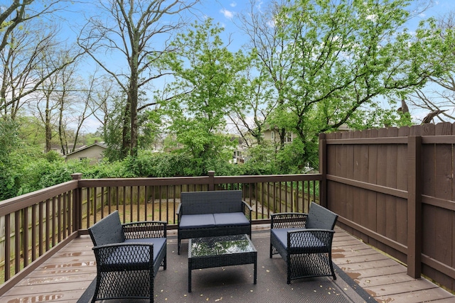 wooden deck with outdoor lounge area