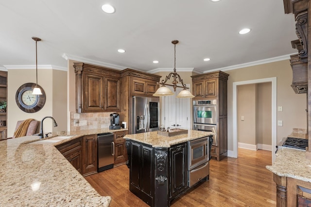 763 Plantation Way, Gallatin, TN 37066 - kitchen featuring ornamental molding, decorative backsplash, stainless steel appliances, light wood finished floors, and a sink