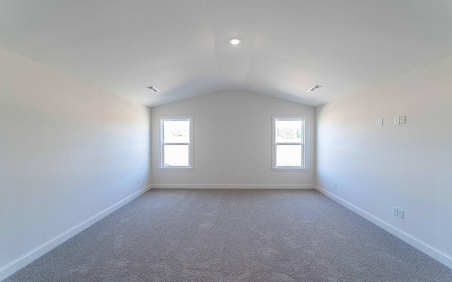 7705 Pine St, Fairview, TN 37062 - carpeted empty room with lofted ceiling and baseboards
