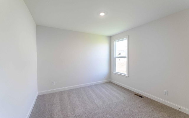 7705 Pine St, Fairview, TN 37062 - unfurnished room with baseboards, light colored carpet, and recessed lighting