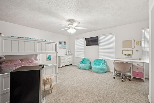 1006 Harmony Ln, Hendersonville, TN 37075 - carpeted bedroom featuring baseboards, a ceiling fan, and a textured ceiling