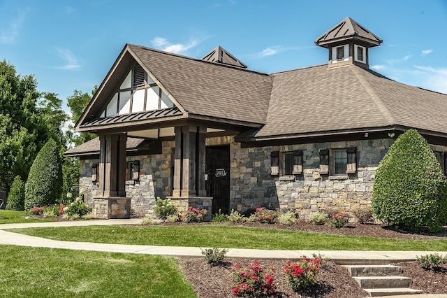 1006 Harmony Ln, Hendersonville, TN 37075 - view of front of house with a shingled roof, stone siding, and a front lawn