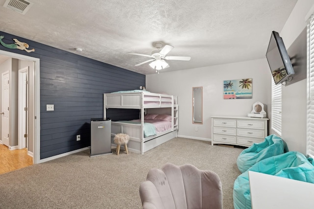 1006 Harmony Ln, Hendersonville, TN 37075 - carpeted bedroom featuring visible vents, a textured ceiling, baseboards, and ceiling fan