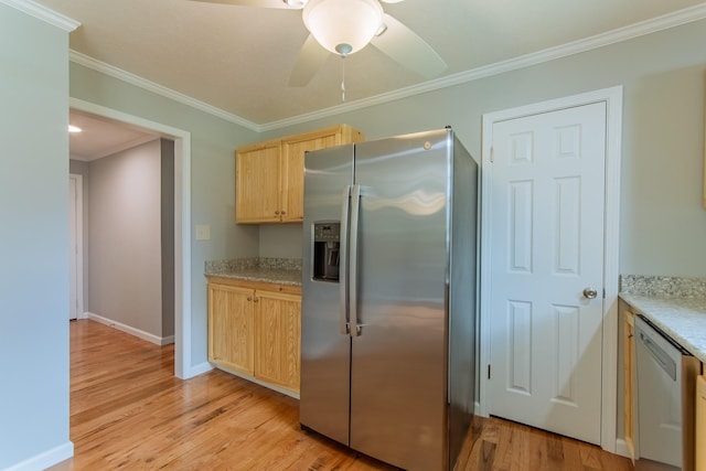 kitchen featuring light wood-style floors, crown molding, light countertops, stainless steel appliances, and light brown cabinets