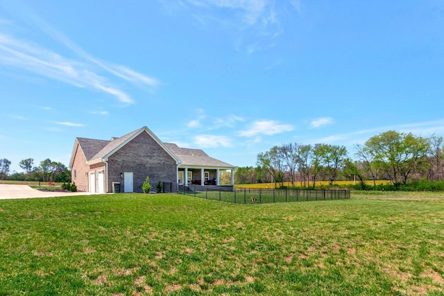 57 Watson Ct, Leoma, TN 38468 - view of yard featuring concrete driveway and a garage