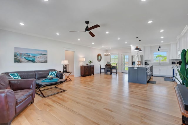 57 Watson Ct, Leoma, TN 38468 - living area featuring light wood-style flooring, a ceiling fan, crown molding, and recessed lighting